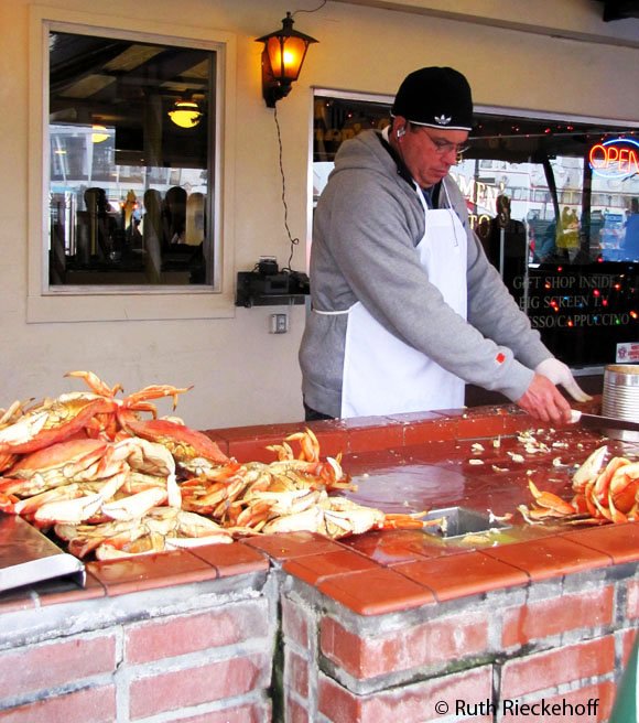 Removing meat from crabs, Fisherman's Wharf, San Francisco, California