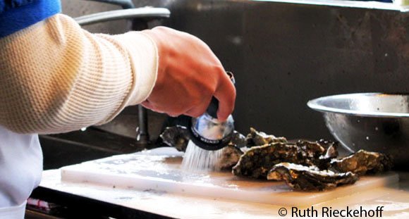 Cleaning oysters, Fisherman's Wharf, San Francisco, California