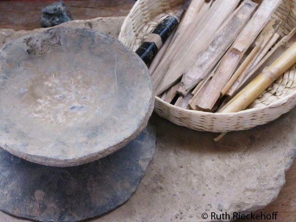 Plates used to shape the pottery, the wooden sticks are used to create shapes in the pottery surface once it is almost dry.