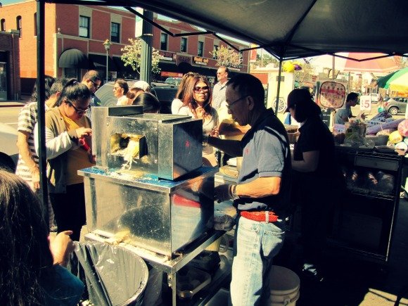Preparing cane juice in Yummie Sandwich and Food To Go, Chinatown, Los Angeles, California