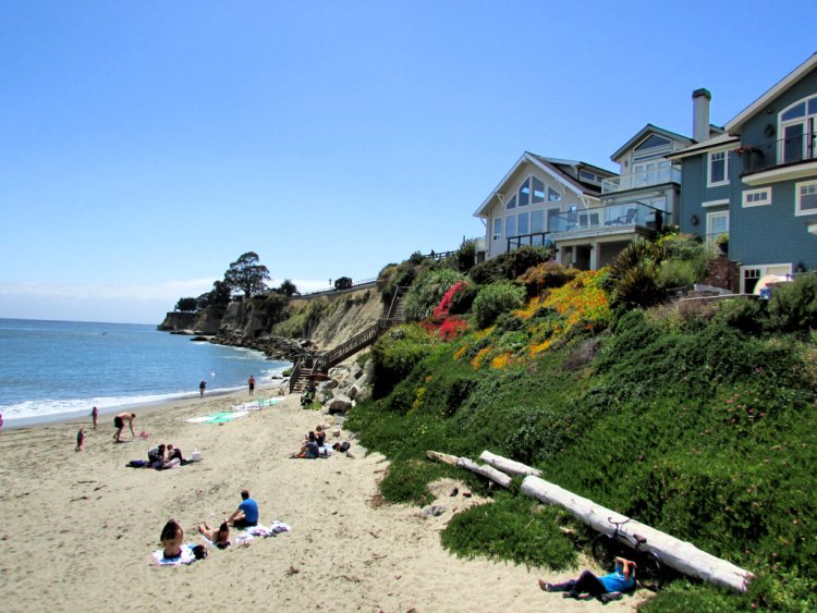 Houses over cliffs on one side of Capitola Beach, Santa Cruz, California