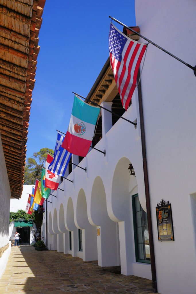 Row of flags near Casa de la Guerra, Santa Barbara, California